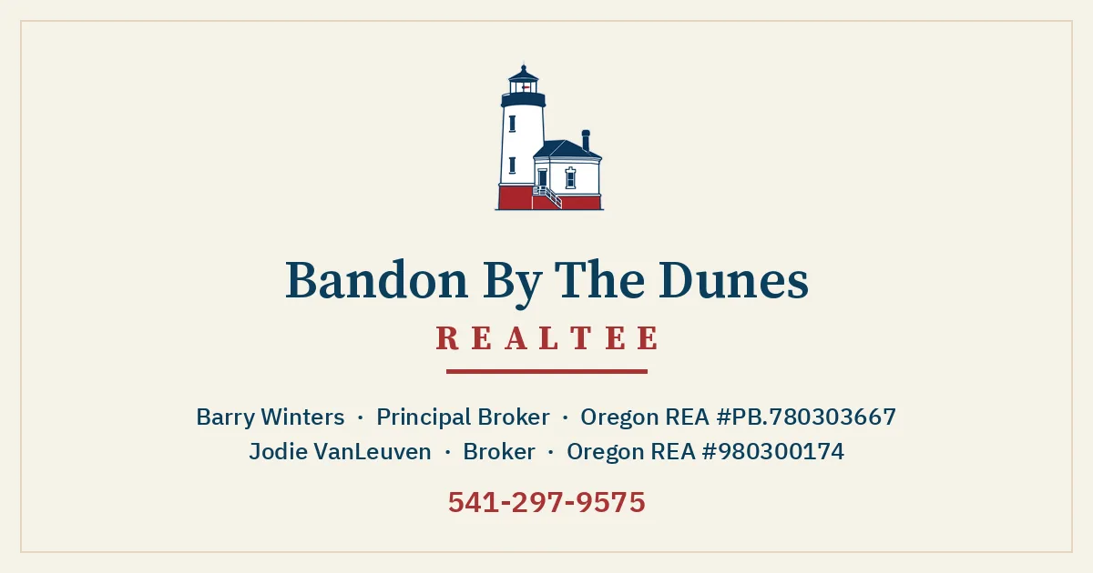Bandon By The Dunes Realtee: navy lighthouse mark on cream.